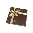 هدايا جورميت دراجيه700غم مشكل بني